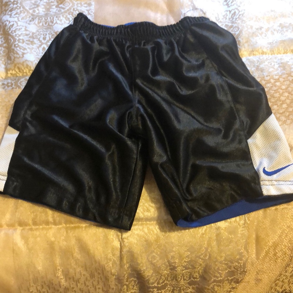 Reversible blue and black Nike basketball shorts